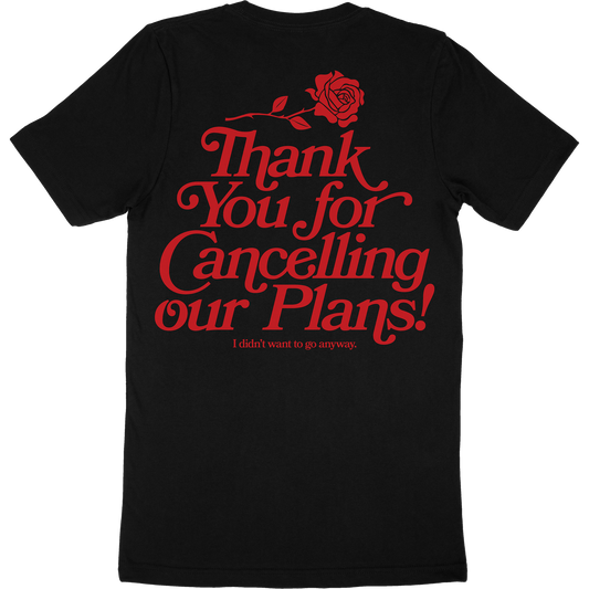 Black t-shirt with artwork of a rose and the words "thank you for cancelling our plans! I didn't want to go anyway" on the back