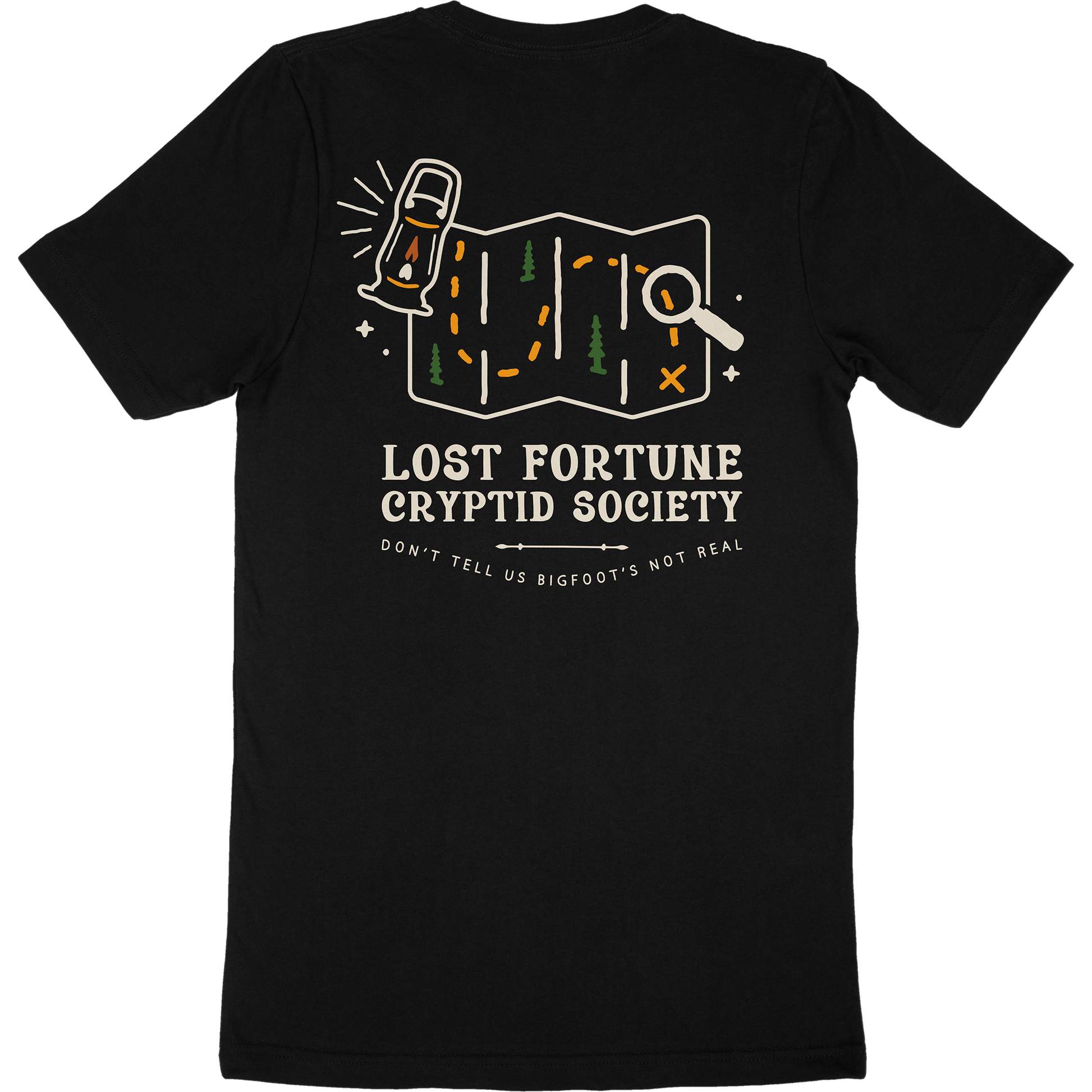 Black t-shirt that has a map and lantern artwork. The words say "Lost Fortune Cryptid Society," and "don't tell us bigfoot's not real."