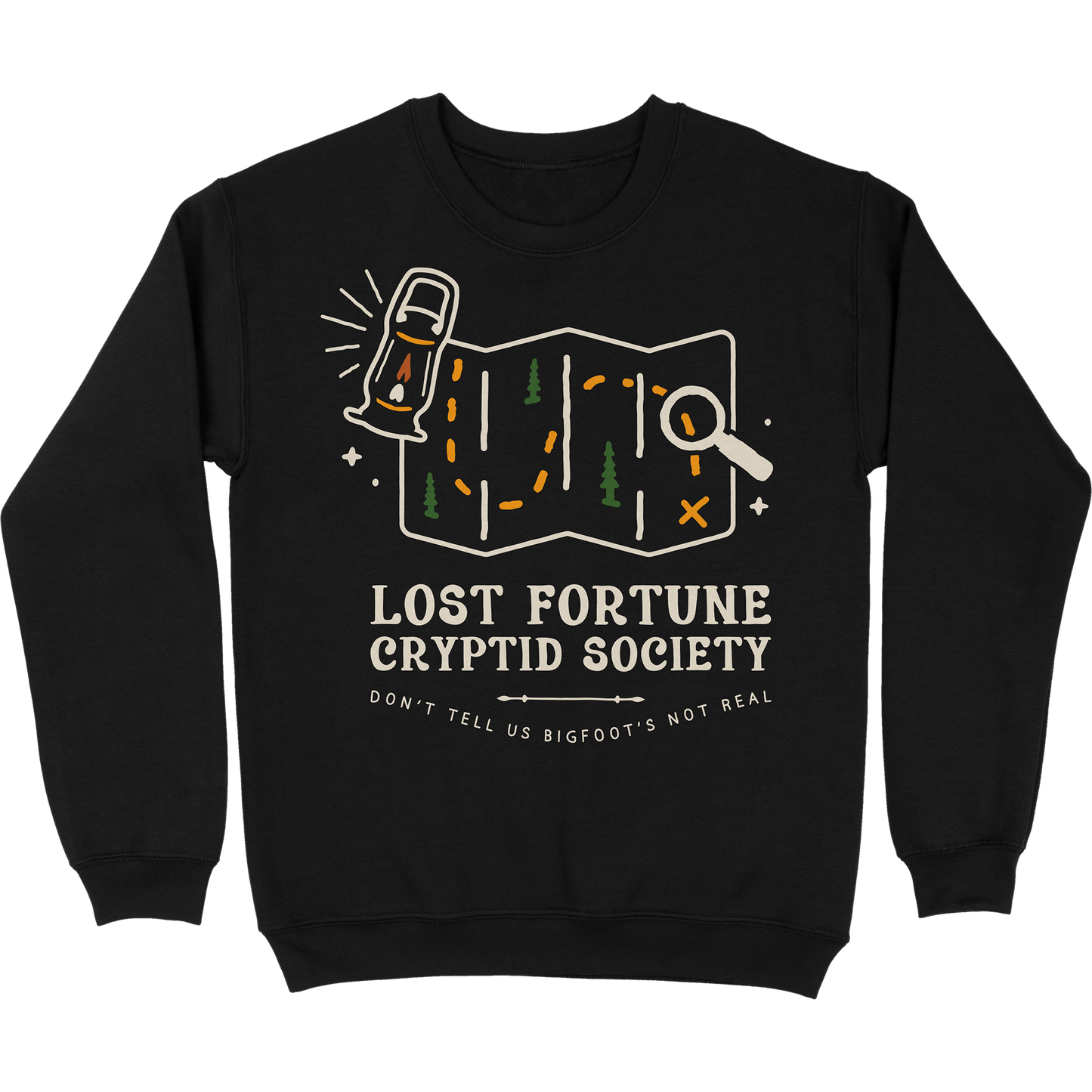 Black crewneck sweatshirt that has a map and lantern artwork. The words say "Lost Fortune Cryptid Society," and "don't tell us bigfoot's not real."