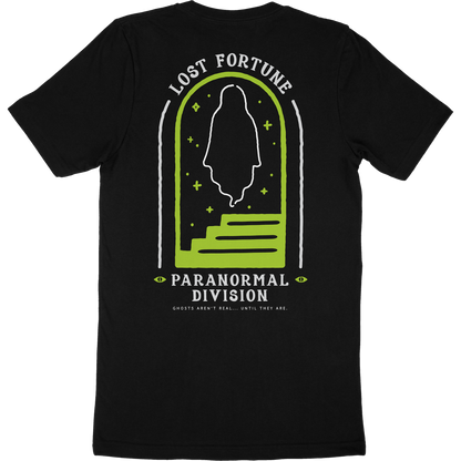 Black t-shirt back that has artwork of a ghost in a doorway with stairs. The text reads "Lost Fortune" at the top and "Paranormal Division" at the bottom. Below that it says "Ghosts aren't real until... they are." 