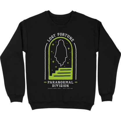 Black crewneck sweatshirt that has artwork of a ghost in a doorway with stairs. The text reads "Lost Fortune" at the top and "Paranormal Division" at the bottom. Below that it says "Ghosts aren't real... until they are." 