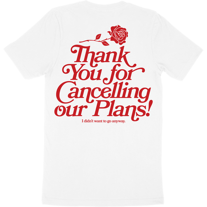 White t-shirt with artwork of a rose and the words "thank you for cancelling our plans! I didn't want to go anyway" on the back