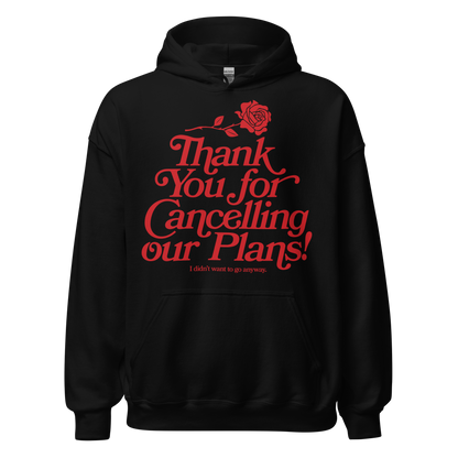 Black hooded sweatshirt with artwork of a rose and the words "thank you for cancelling our plans! I didn't want to go anyway" on the front