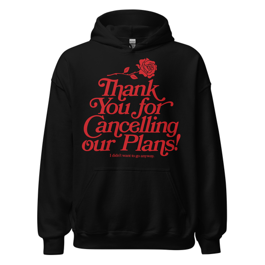 Black hooded sweatshirt with artwork of a rose and the words "thank you for cancelling our plans! I didn't want to go anyway" on the front